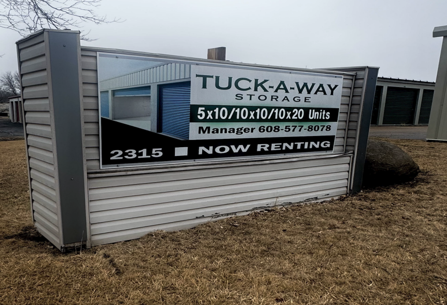 The Tuck-A-Way Storage sign showing 5x10, 10x10 and 10x20 units, now renting, at 2315 Pinehurst Drive in Middleton, Wisconsin